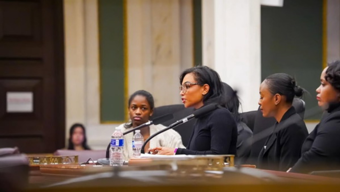 Jamie speaking at City Hall panel hearing